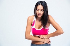  woman with stomach pain