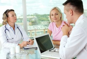 doctors and patient discussing