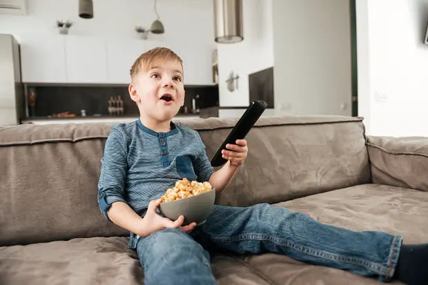 kid watching TV